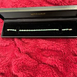 10 karat gold and genuine diamond and emerald bracelet